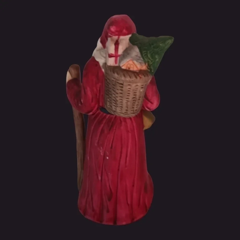 Santa fugurine with bell and christmas tree christmas decor
